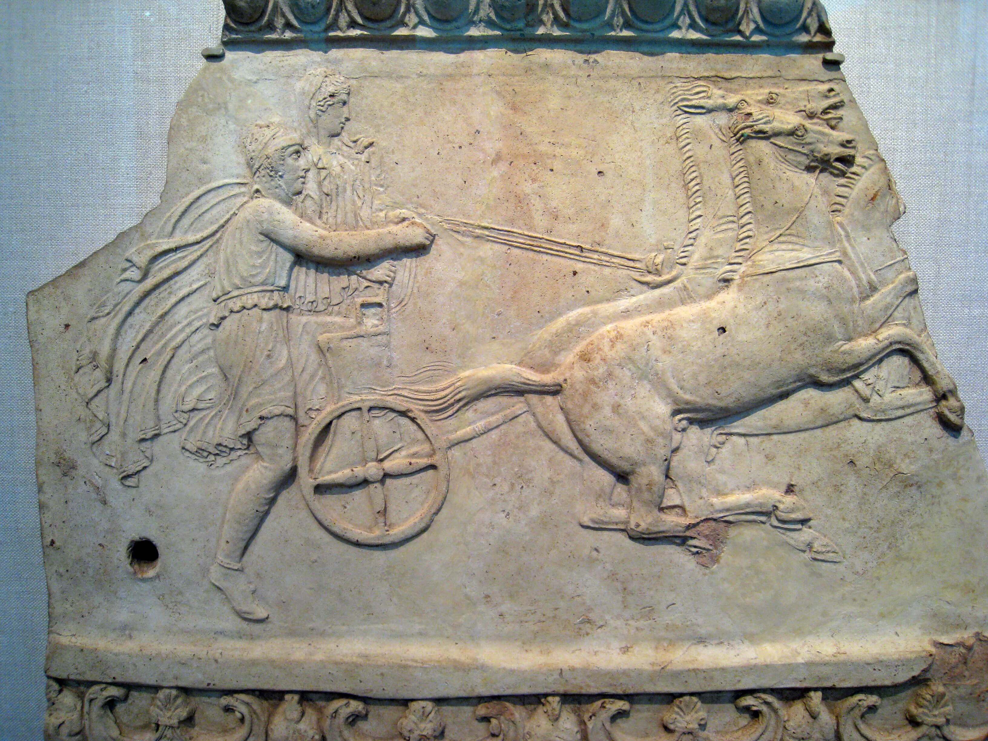 stone engraving of pelops on his chariot