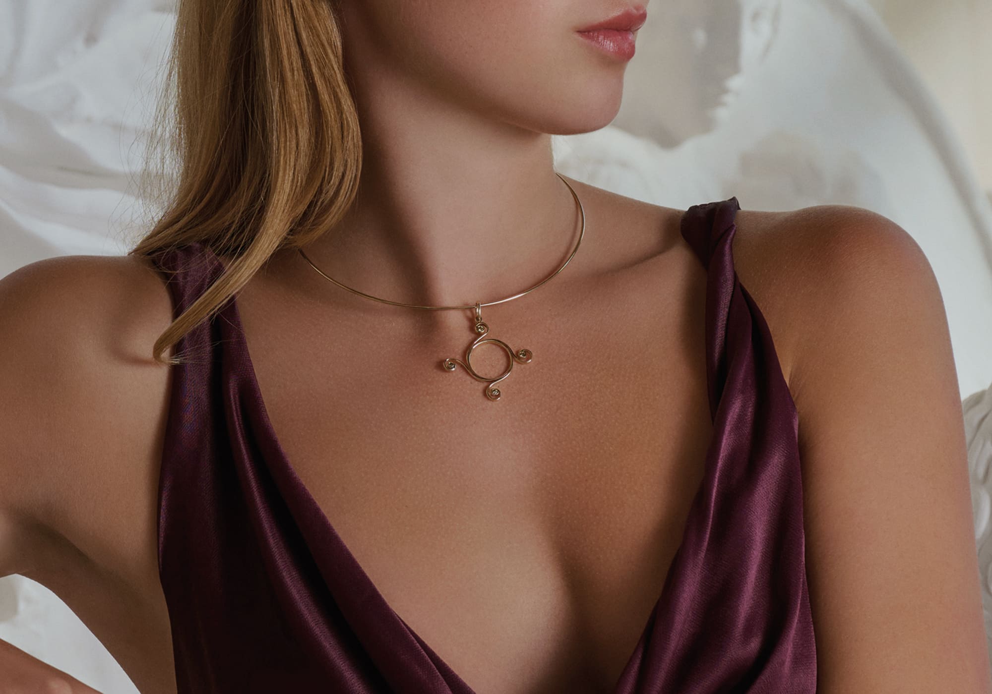 model wears handcrafted Athena necklace