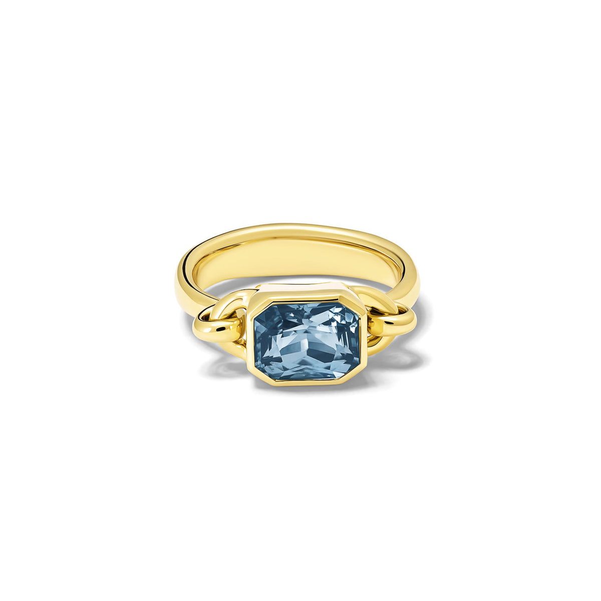 Handcrafted Baguette ring in 18ct yellow gold with emerald-cut blue sapphire, September birthstone.