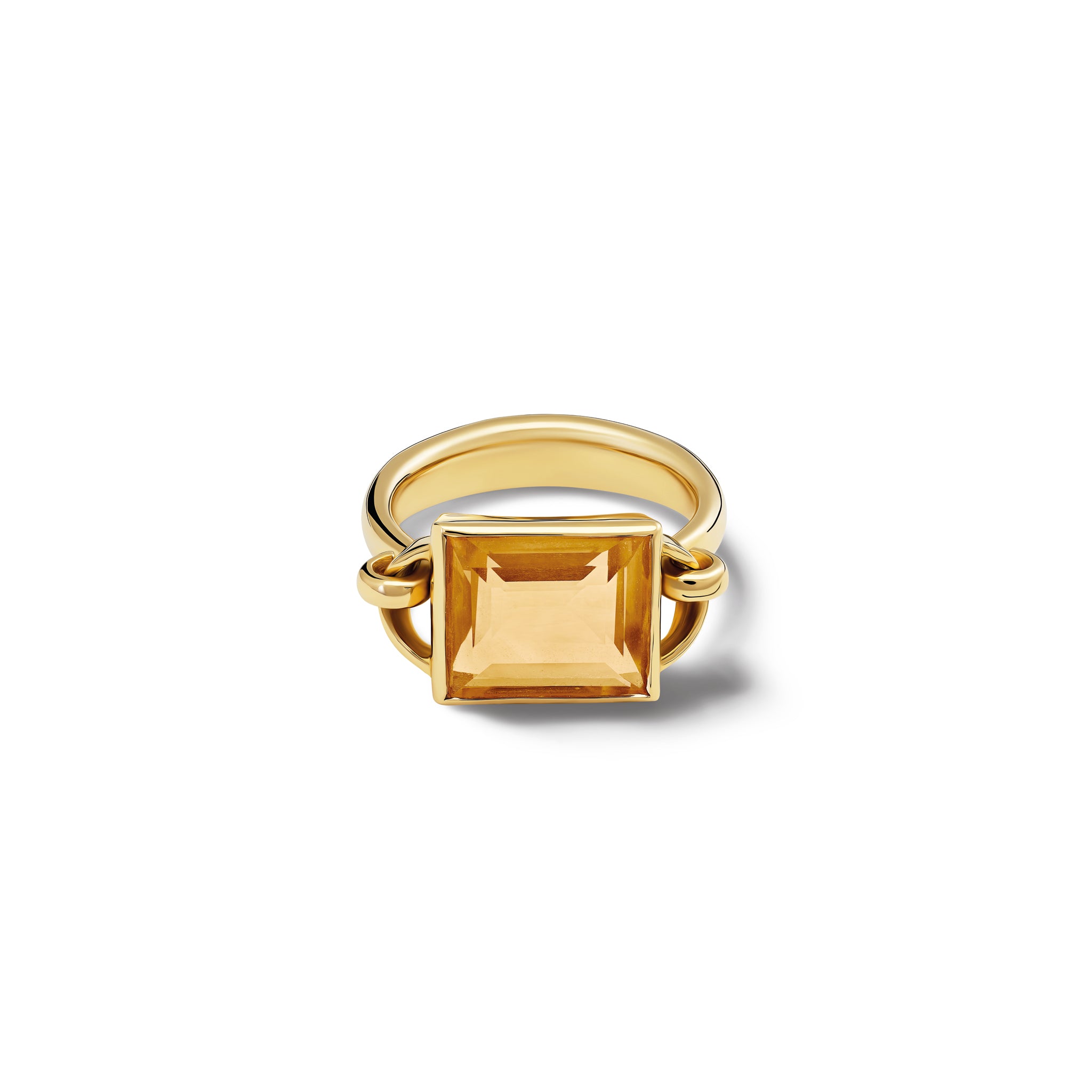 Handcrafted yellow gold ring featuring a central baguette cut citrine, birthstone of November.