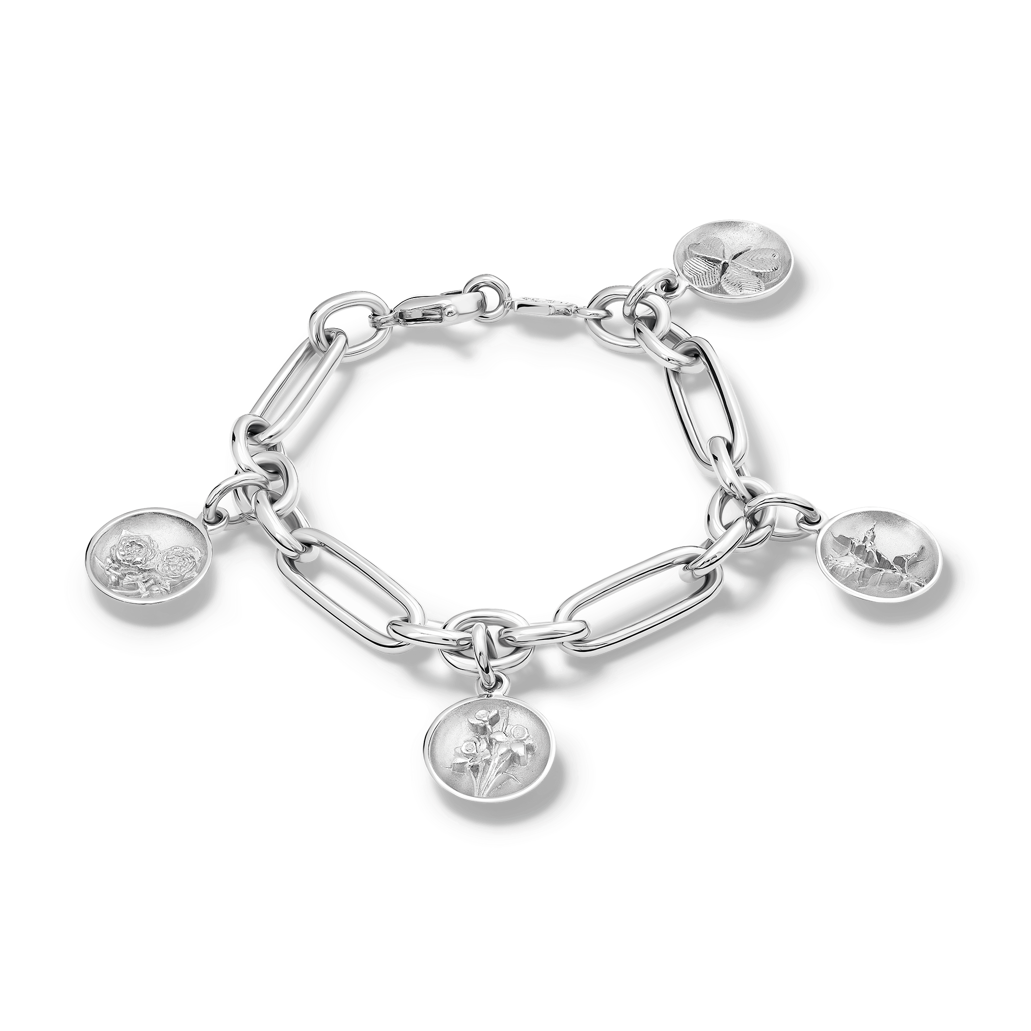 Handcrafted silver bracelet with flower medallion charms attached.