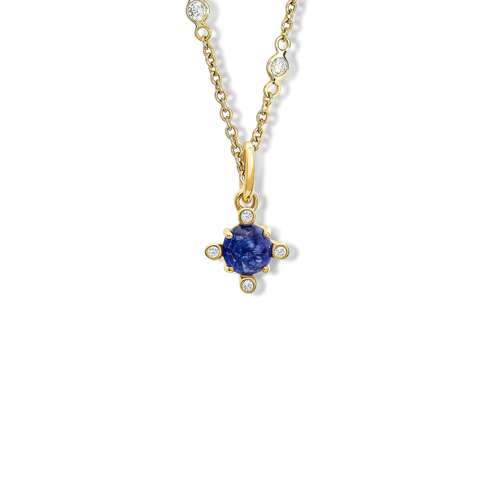 Handcrafted Compass small necklace pendant in yellow gold with cabochon tanzanite set with four diamonds.