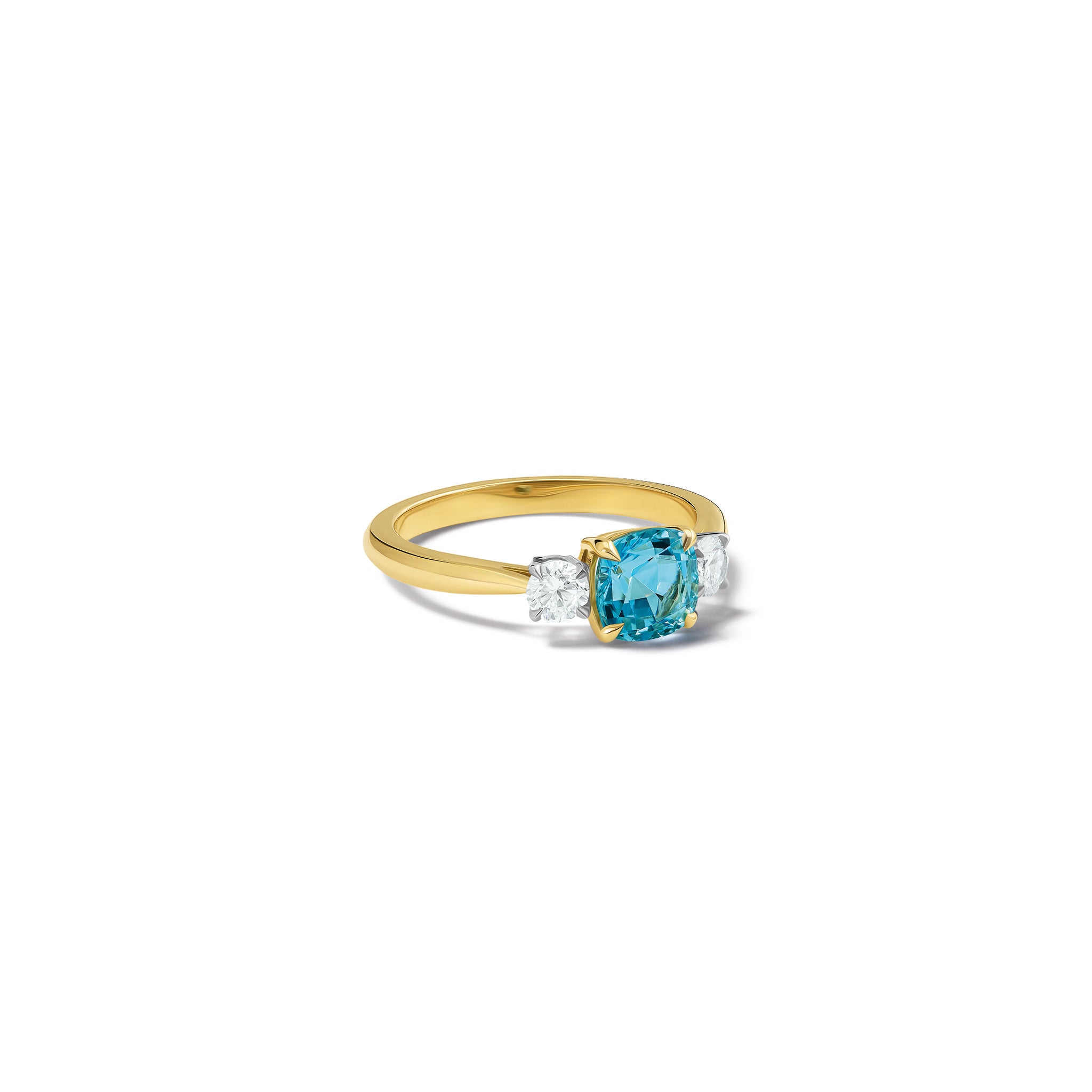 Handcrafted Delilah engagement ring in 18ct yellow and white gold with aquamarine and diamond.
