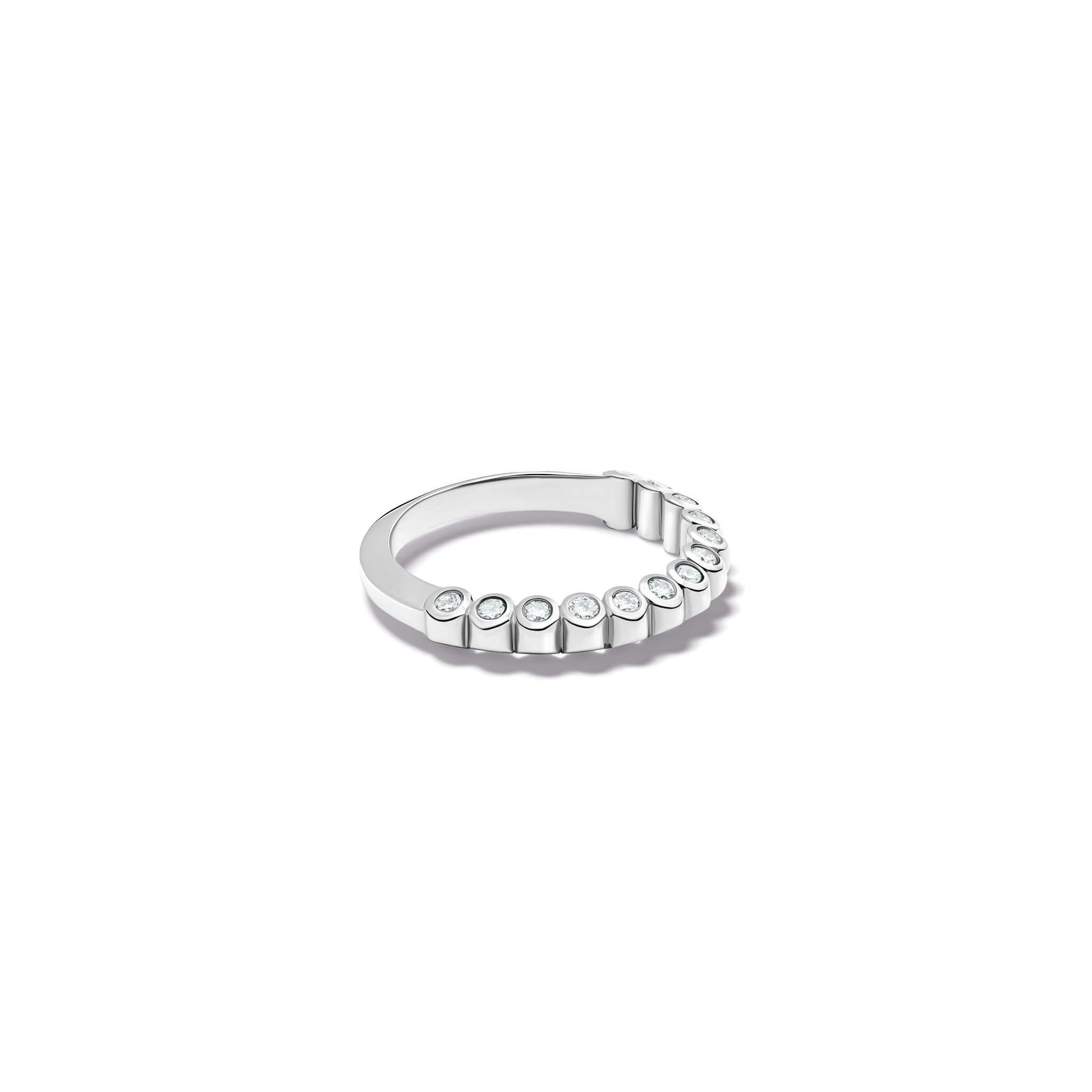 Handcrafted 18ct white gold eternity ring with diamonds on the side of the shank and smooth ridges along the top.