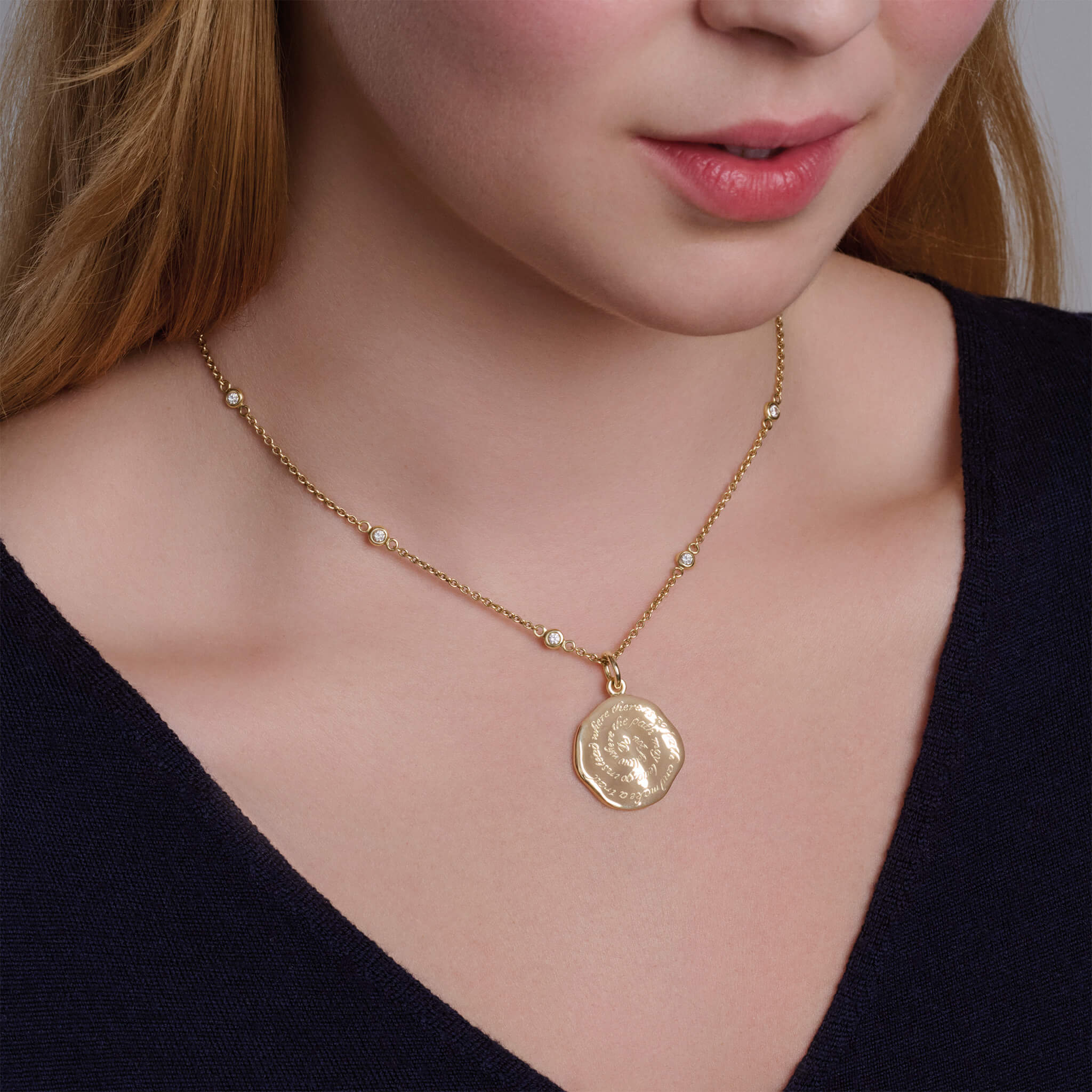 Cassandra Goad Quote pendant.