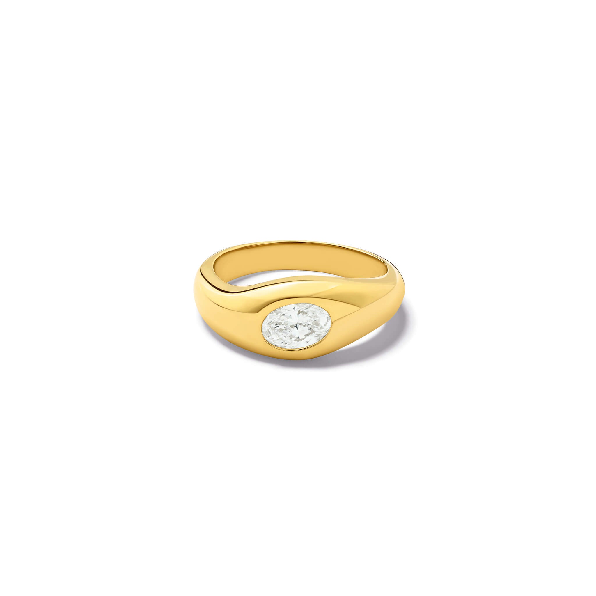Handcrafted yellow gold ring with a slight teardrop design set with an oval facetted diamond.