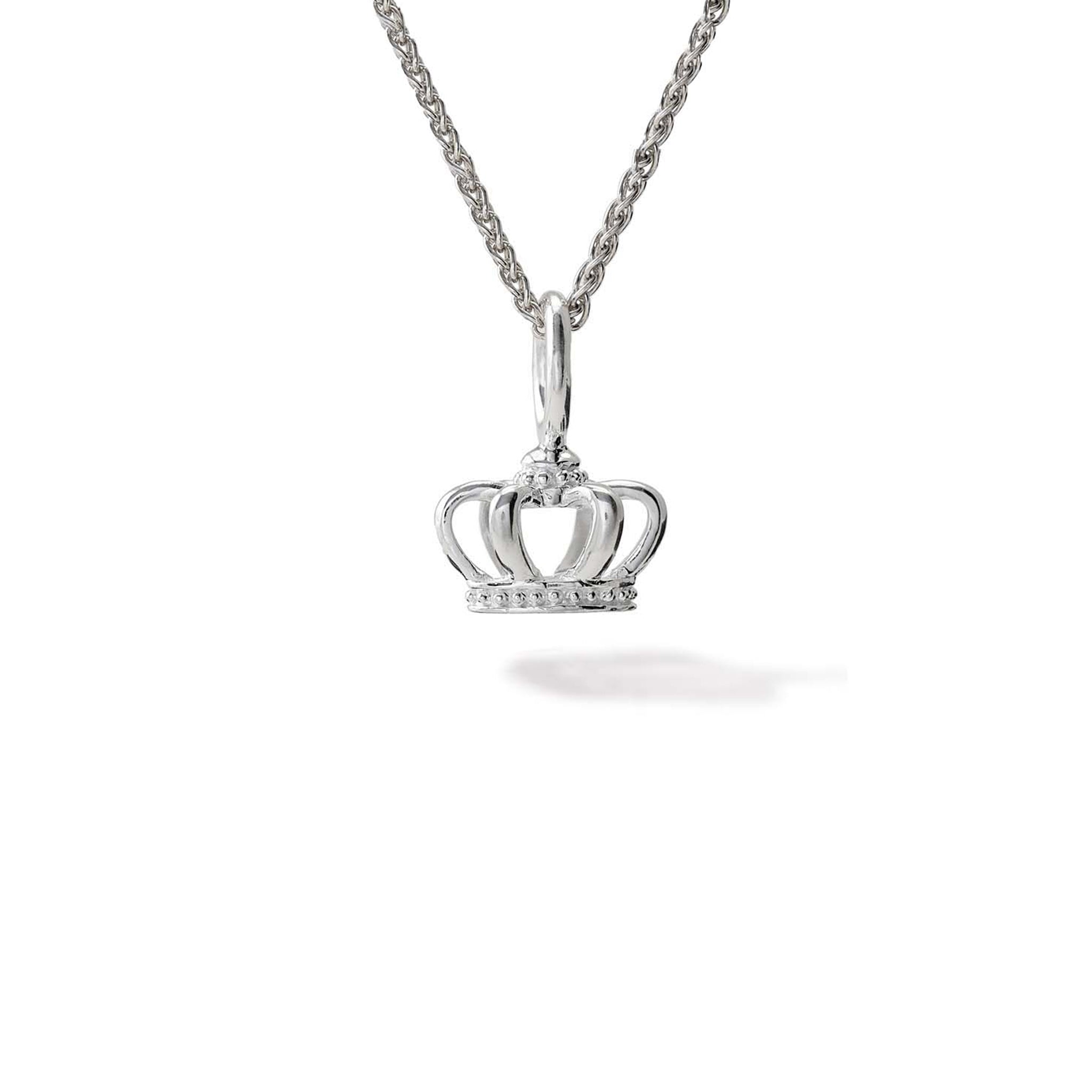 Handcrafted silver charm pendant inspired by a Finnish crown. 