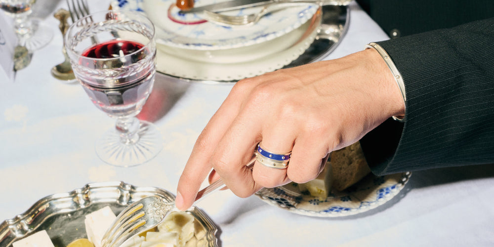 model wearing decimus rings and cuff at Christmas dinner