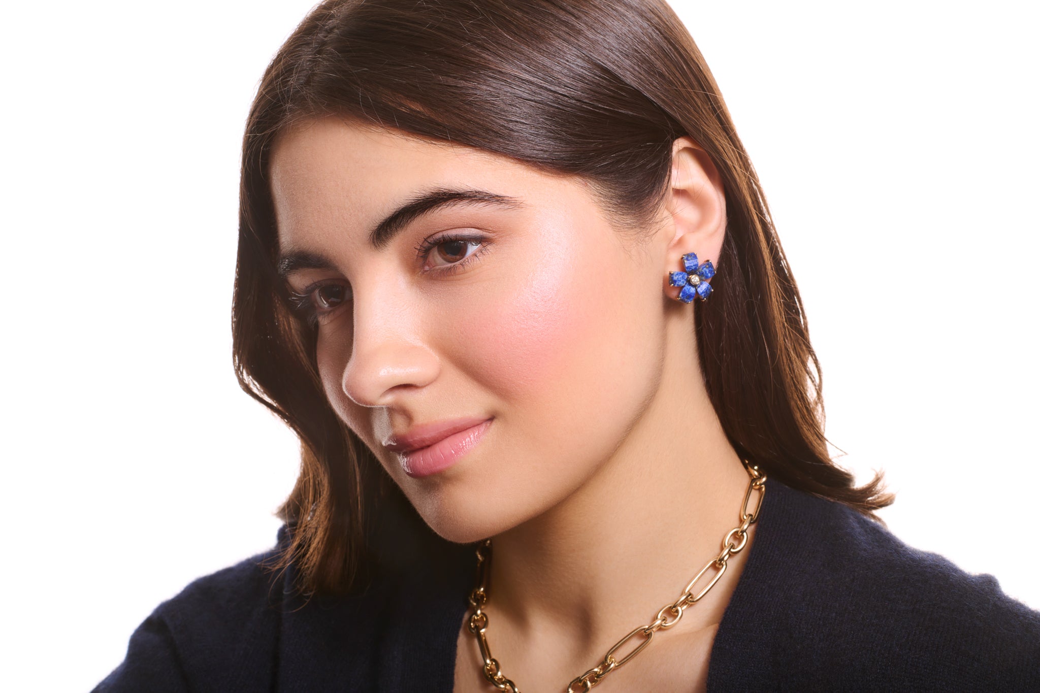 Model wearing Frangipani earrings from Brazil collection.