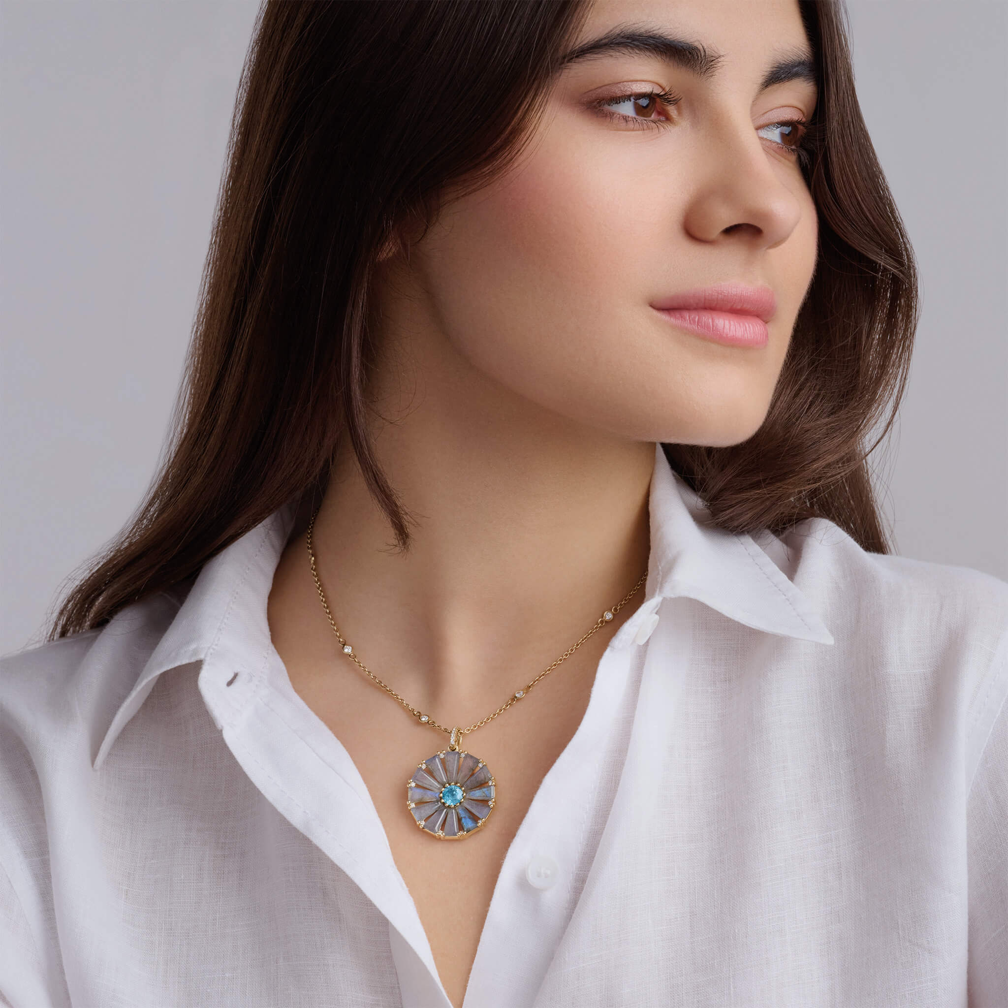 Roi Soleil pendant with labradorite, blue zircon and diamond.