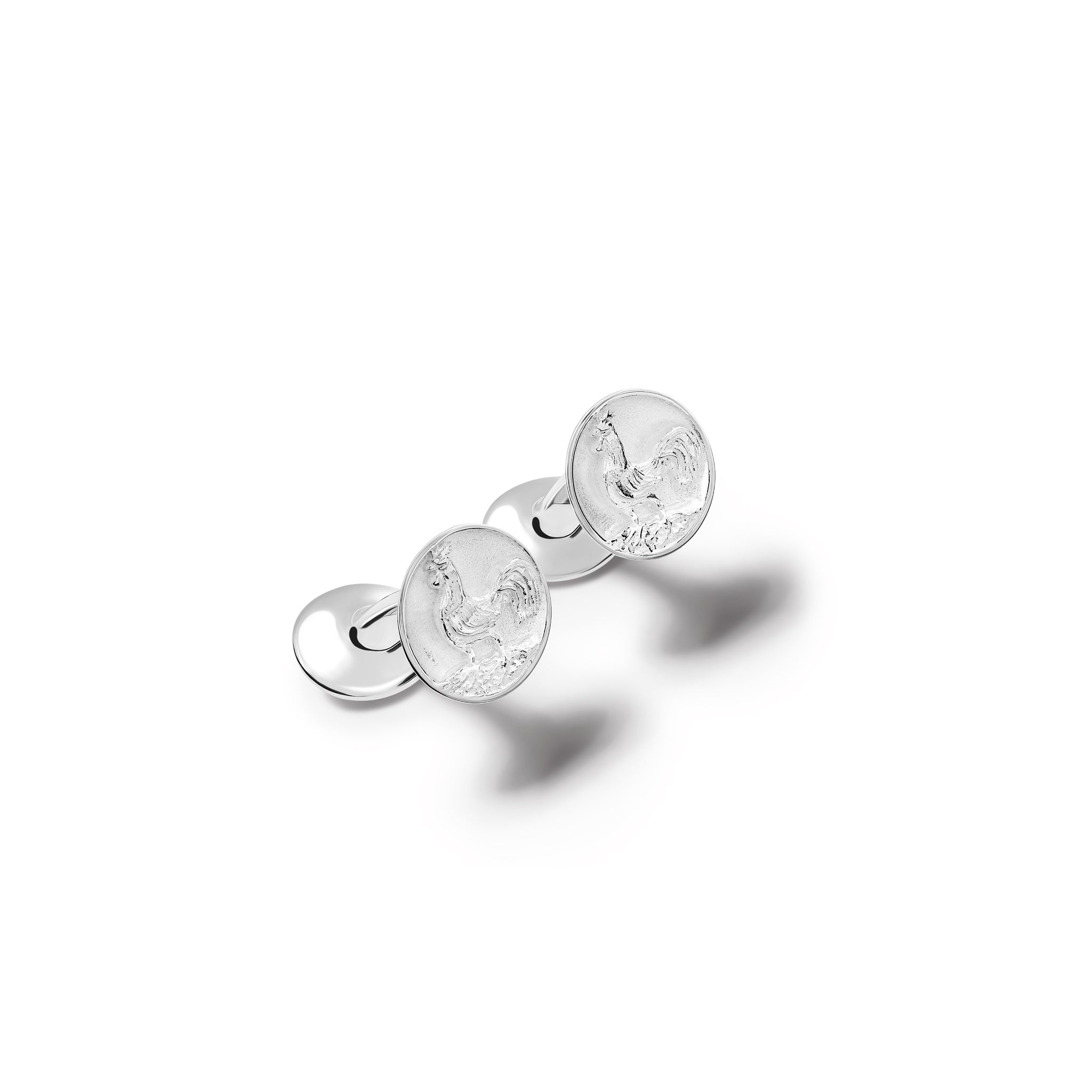 Handcrafted silver single ended cufflinks 'en relief' with the le coq in France. 