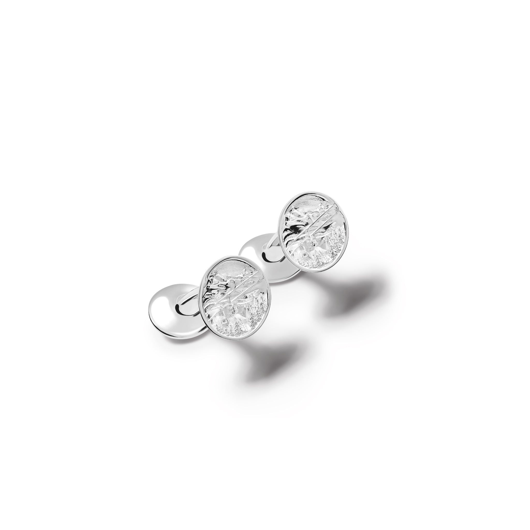 Handcrafted silver single ended cufflinks 'en relief' with the mountains in France.