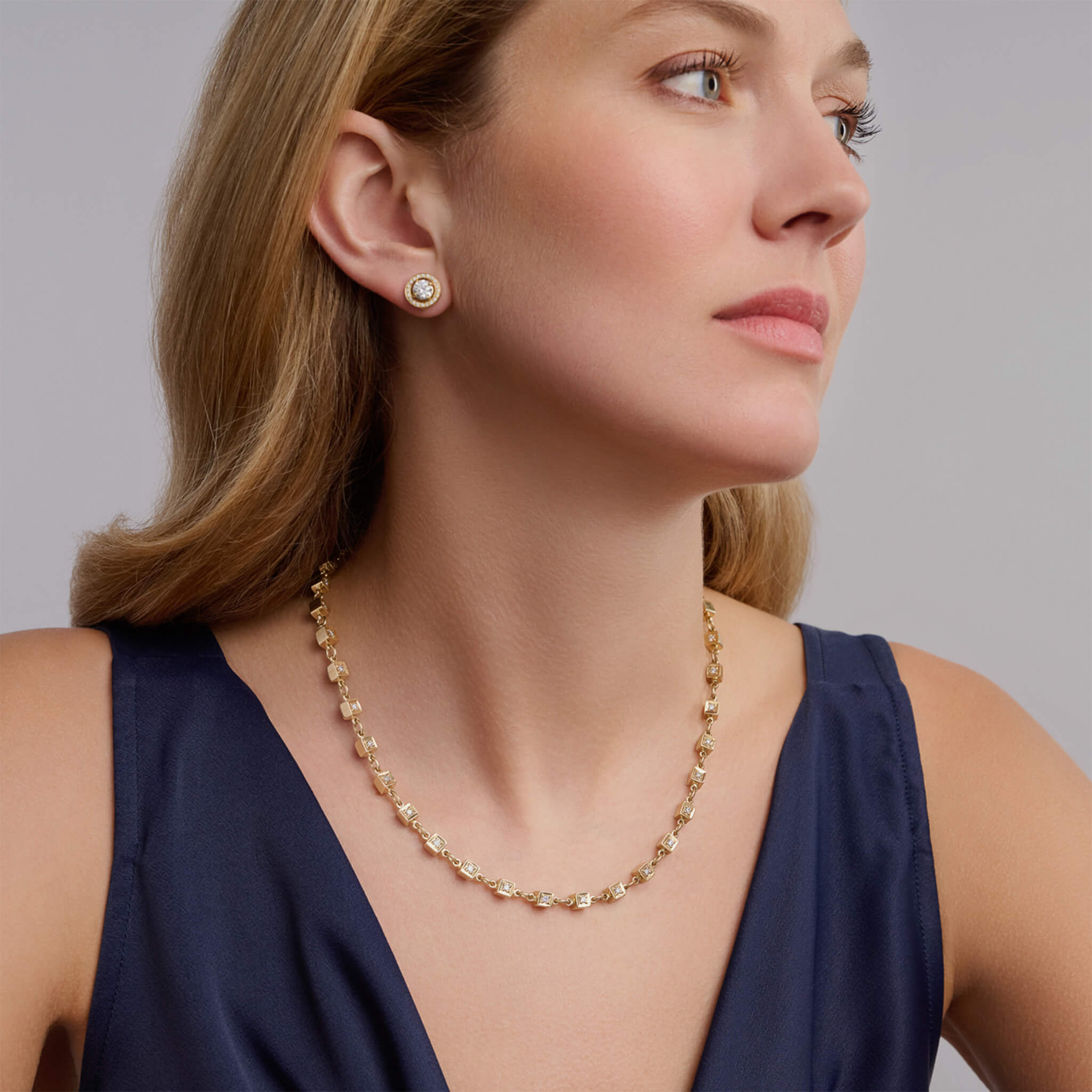 Handcrafted yellow gold necklace featuring boxes with diamonds.