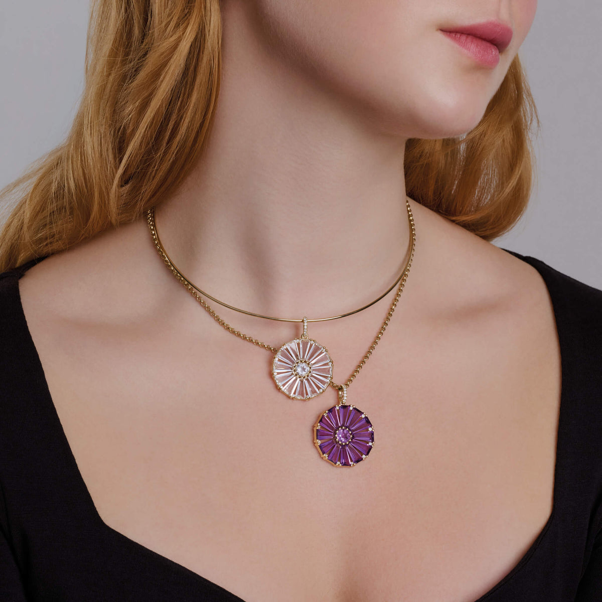 Model wears two Roi Soleil large pendants, one with amethyst and one with white topaz, both with diamond. The birthstone for February and November.