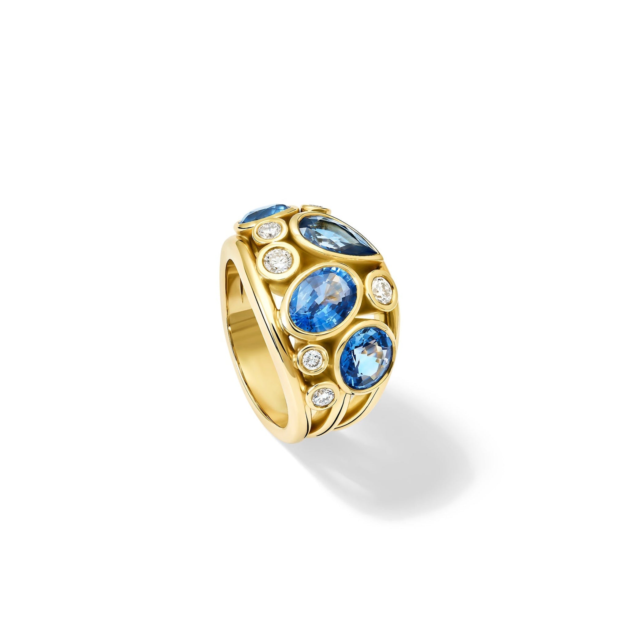 Handcrafted 18ct yellow gold ring featuring four soft blue ceylon sapphires and smaller diamonds, September birthstones.