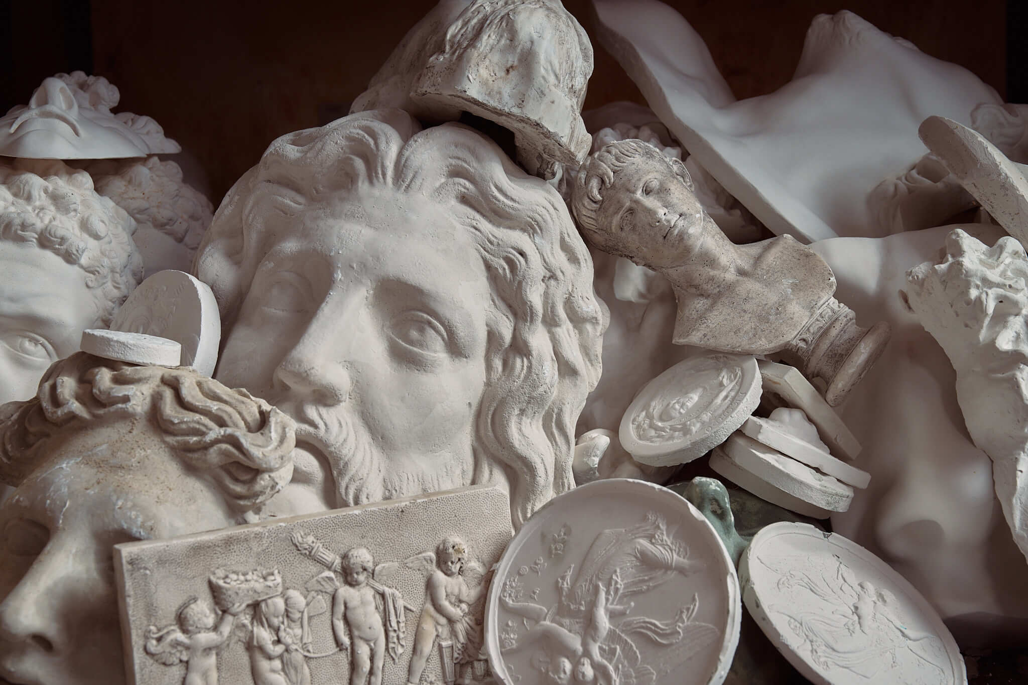 Handcrafted white sculptures made from plaster and inspired by Greece
