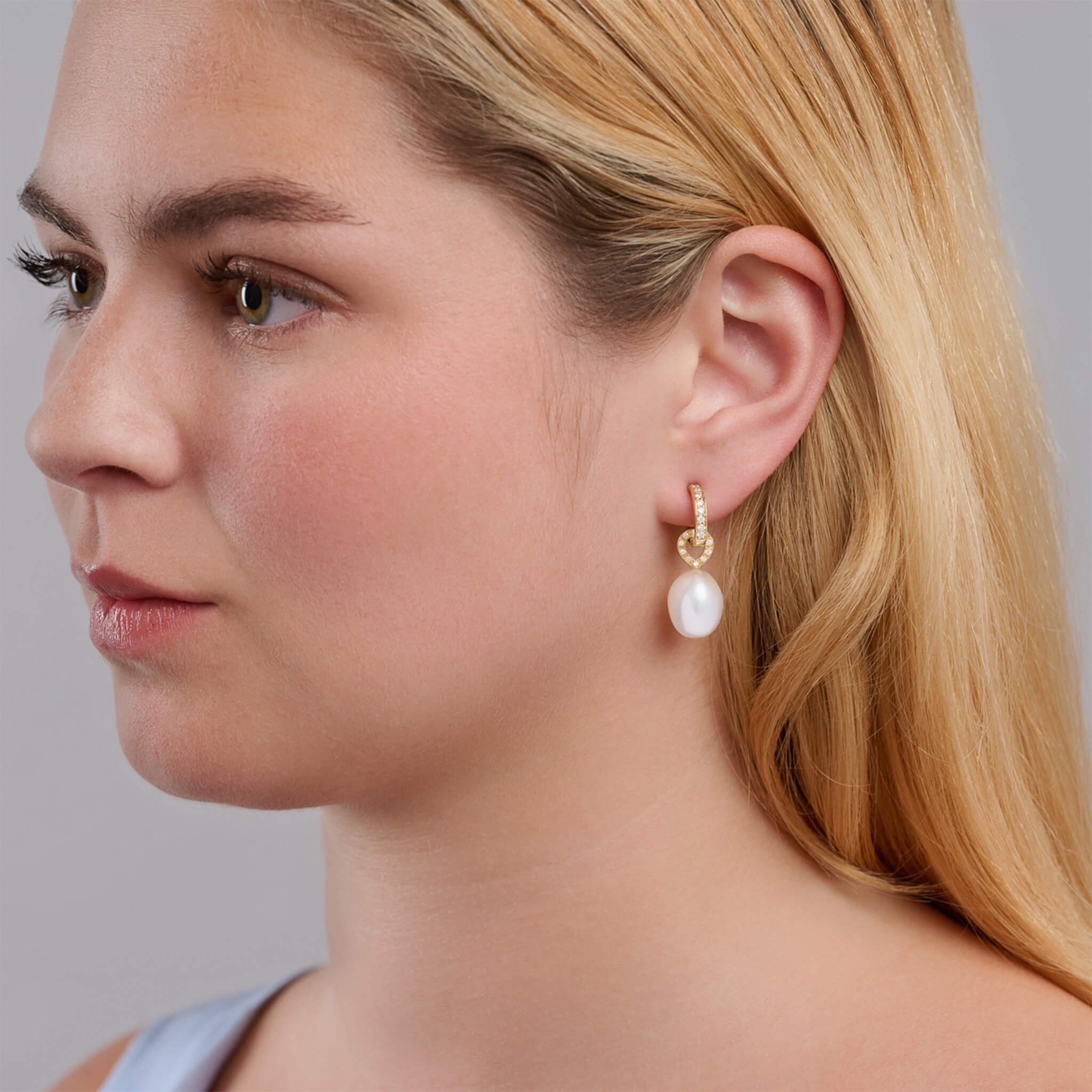 Handcrafted earring drops in 18ct yellow gold with pearl and diamond pave.