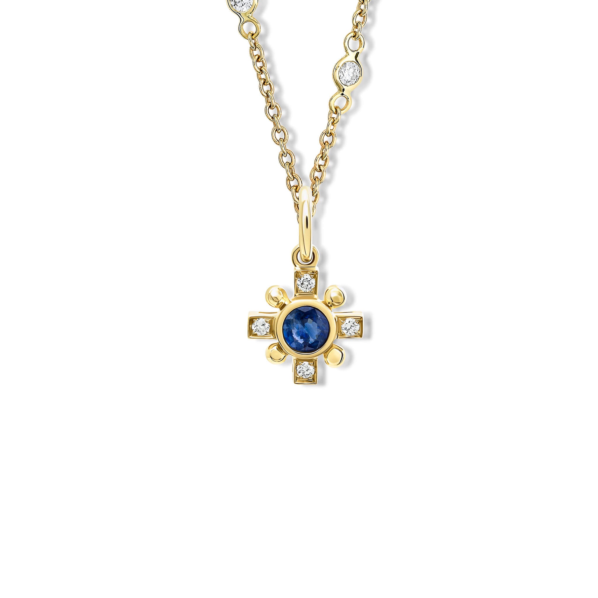 Handcrafted Quadro cross necklace pendant in yellow gold featuring a central blue sapphire and diamond, september birthstone