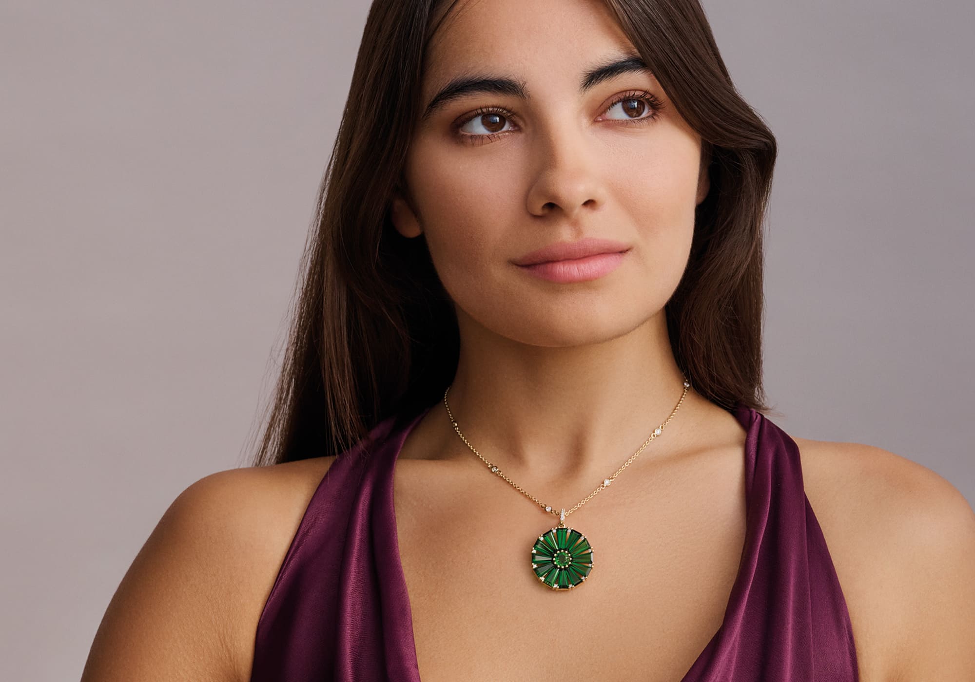 Model wears handcrafted Roi Soleil necklace