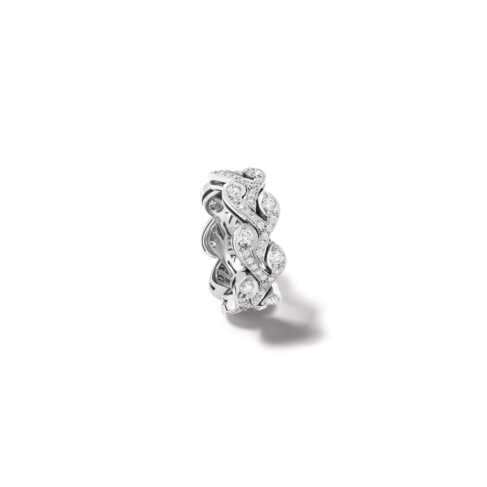Handcrafted 18ct white gold engagement ring resembling rosemary sprigs, embellished with diamonds.