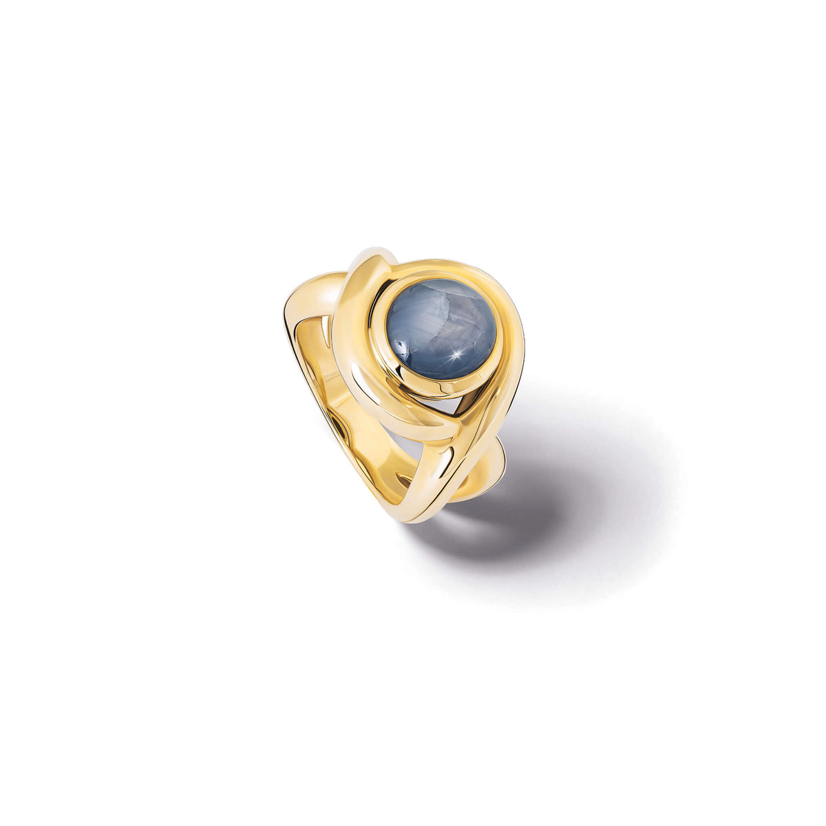 Handcrafted 9ct yellow gold ring featuring curved shanks with a round cabochon star sapphire, September birthstone.