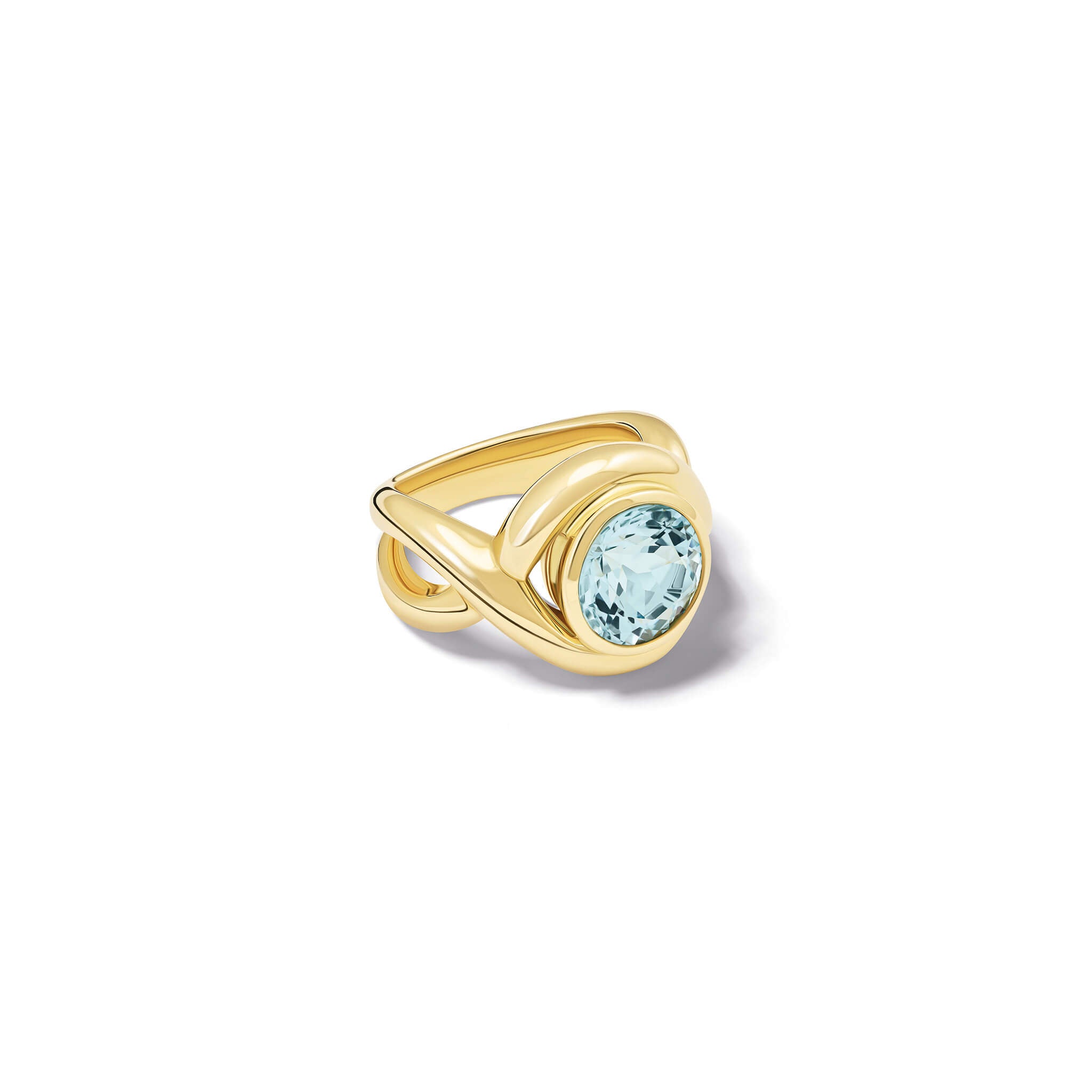 Handcrafted yellow gold ring featuring curved shanks with a round blue topaz, birthstone of November.