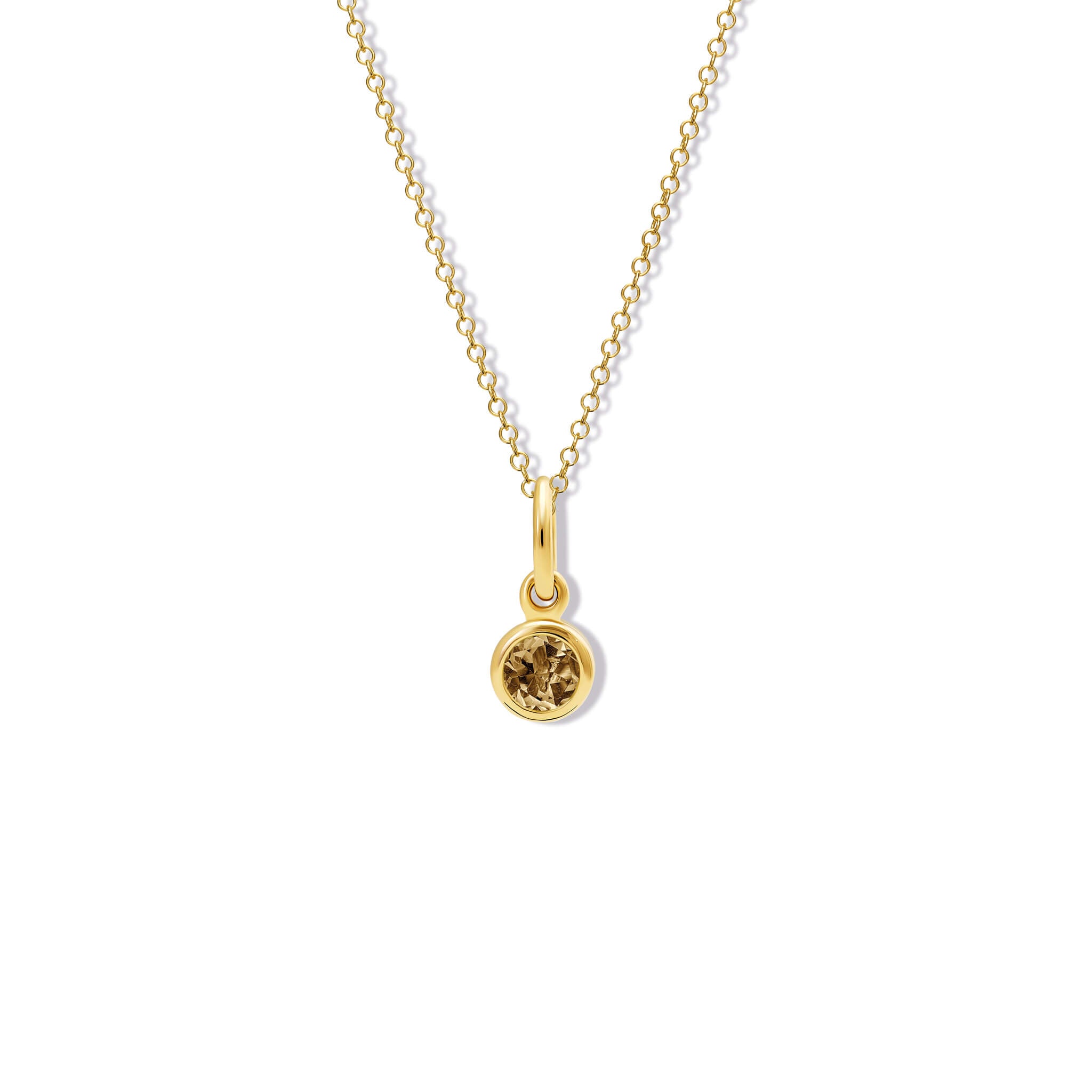 Handcrafted necklace pendant in yellow gold featuring a round smoky quartz.