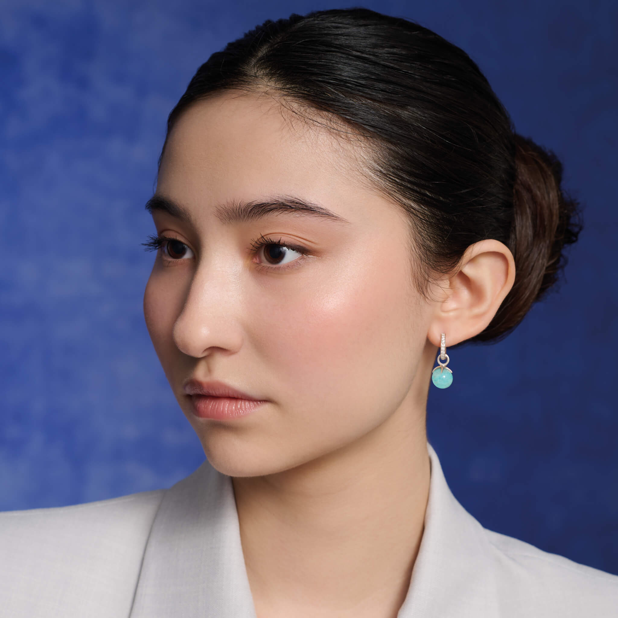 Handcrafted yellow gold earring drops with  round aquamarine beads, birthstone of March.