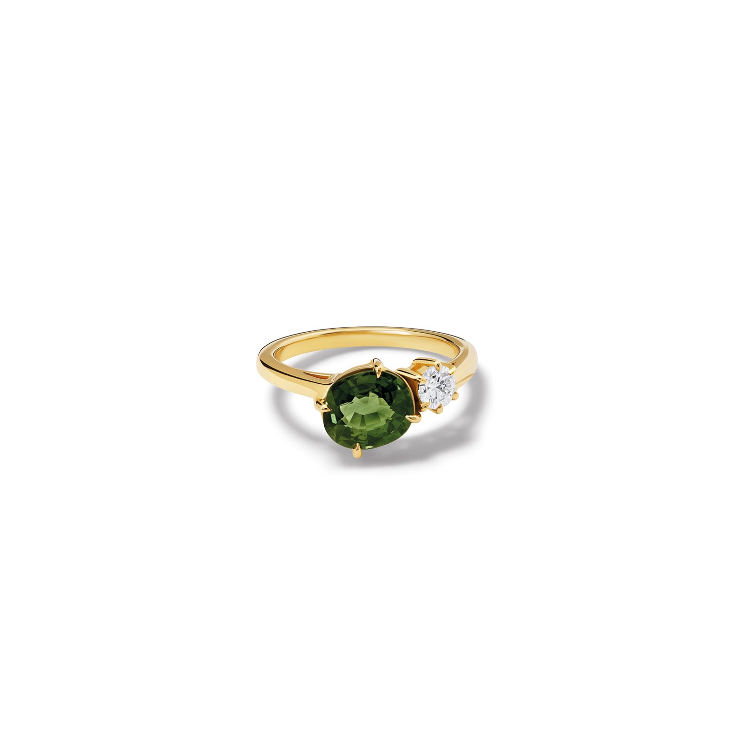 Handcrafted 18ct yellow gold ring featuring a green sapphire and diamond.