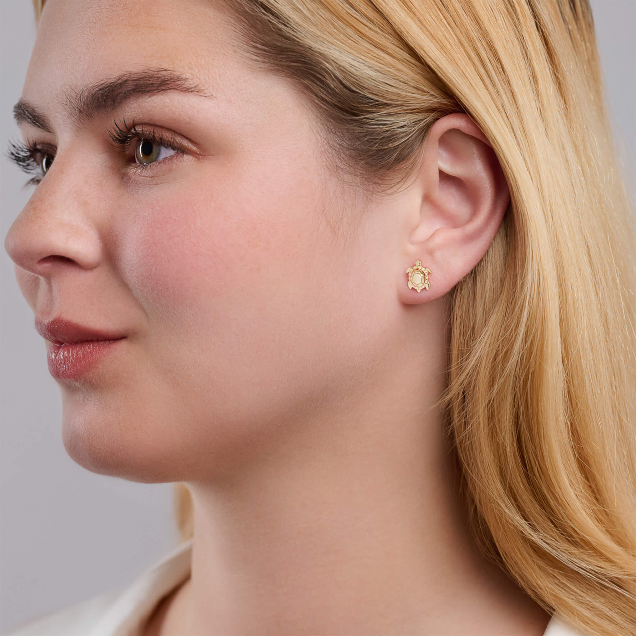 Handcrafted 9ct yellow gold turtle shaped earrings.