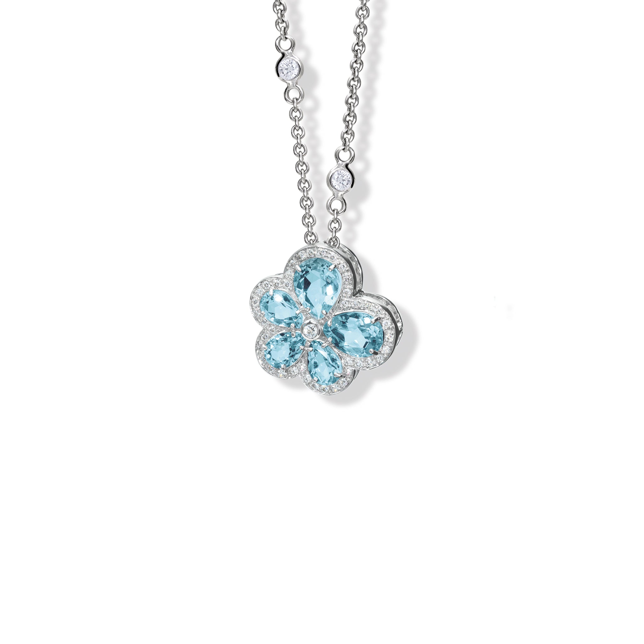 Handcrafted 18ct white gold flower pendant with aquamarine petals and diamond accents, birthstone of March.