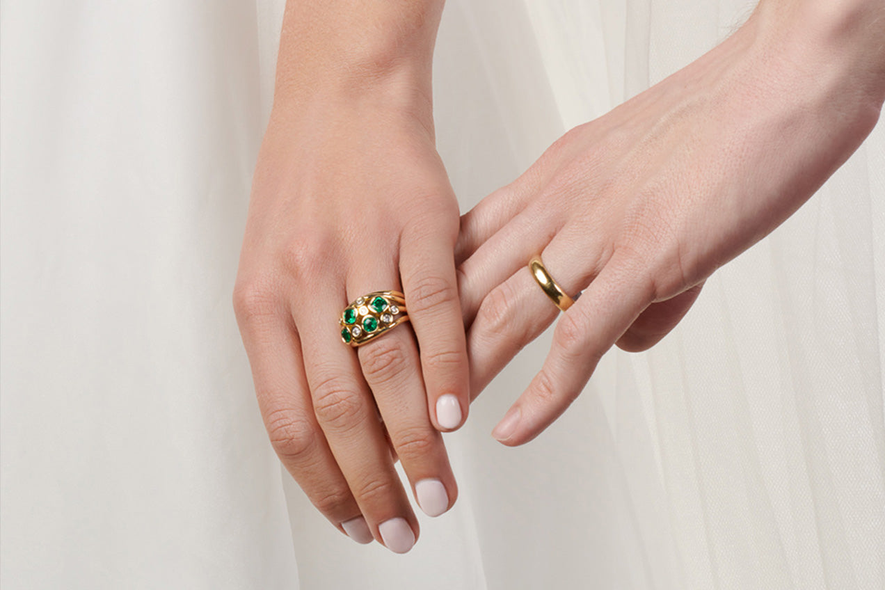 models wearing handcrafted yellow gold wedding bands, rings for wedding day